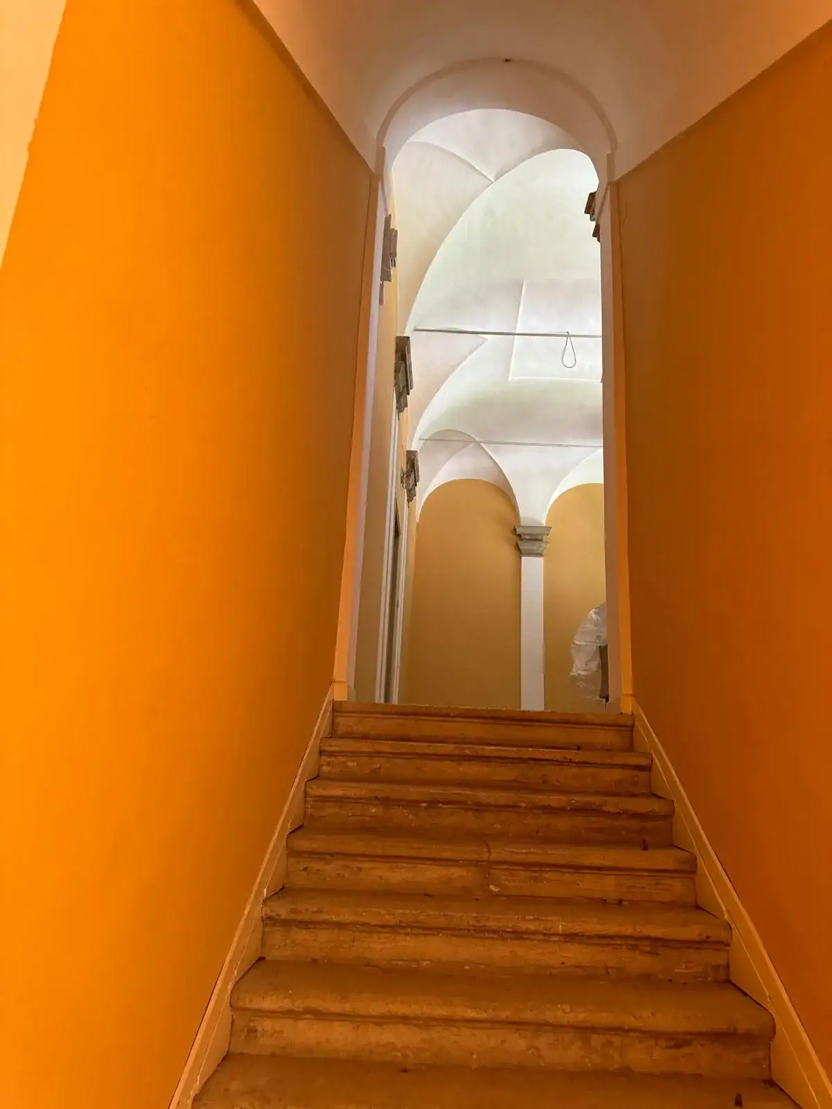 Staircase leading to the arched loggia